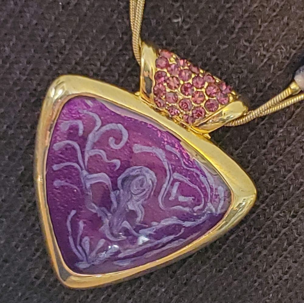 Goldtone purple triangle stone pendant necklace with rhinestones